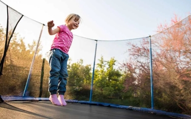 How a Backyard Trampoline Helps Children Grow and Exercise